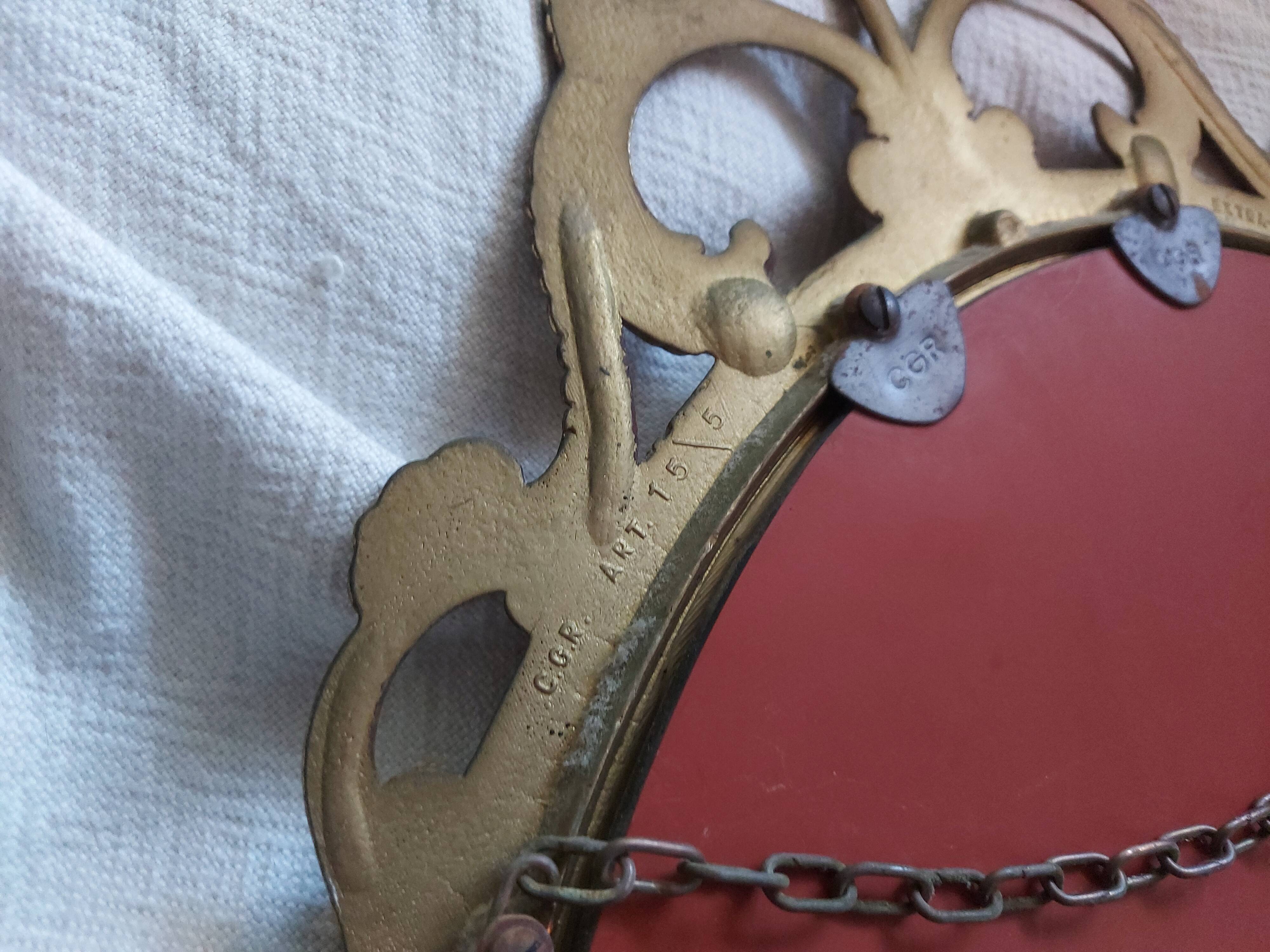 Baroque mirror in gilded brass, C.G.R