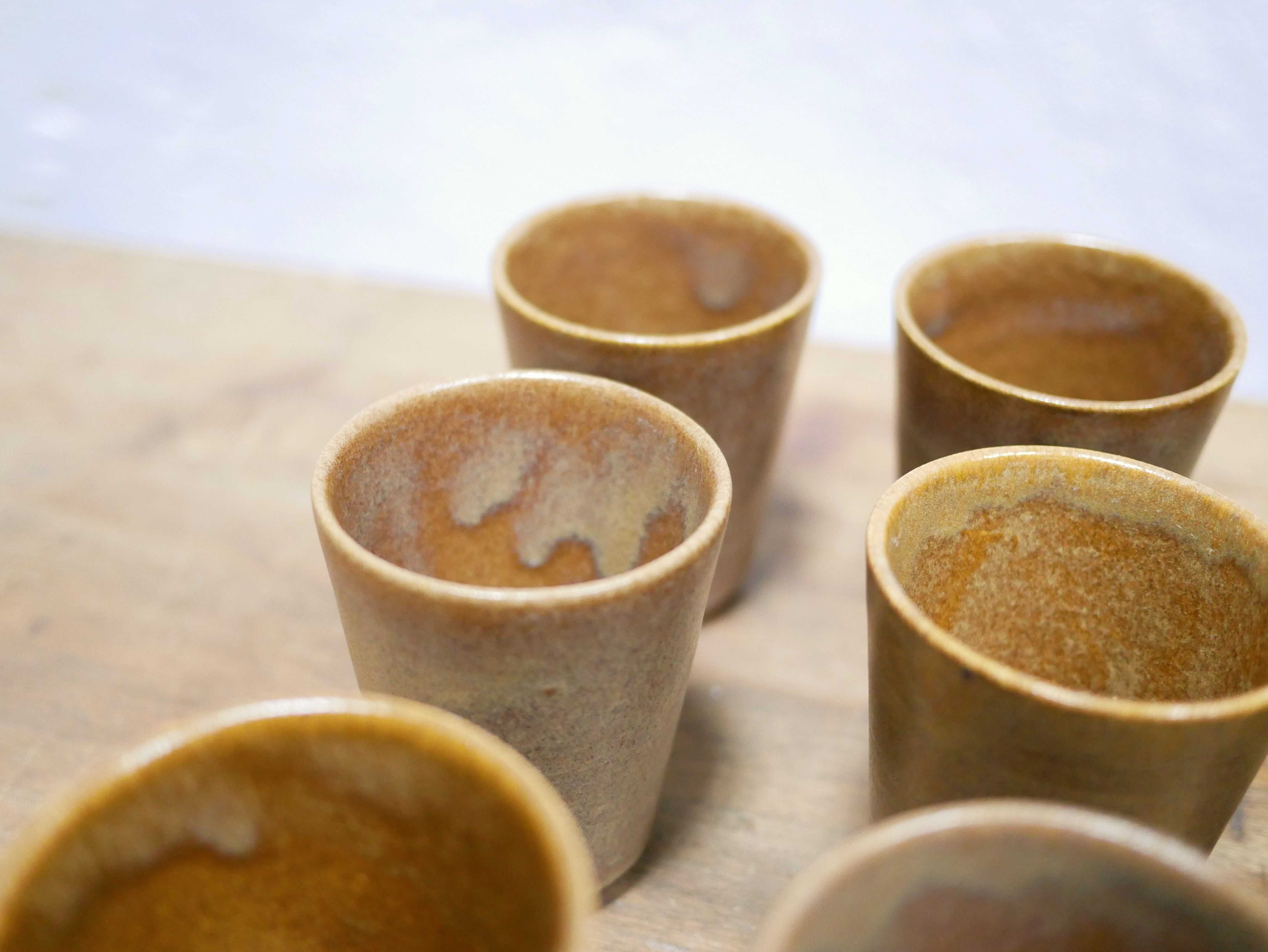 Series of 4 vintage stoneware glasses by the manufacture of Digoin, France