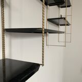 Vintage wall shelves in gold and black metal