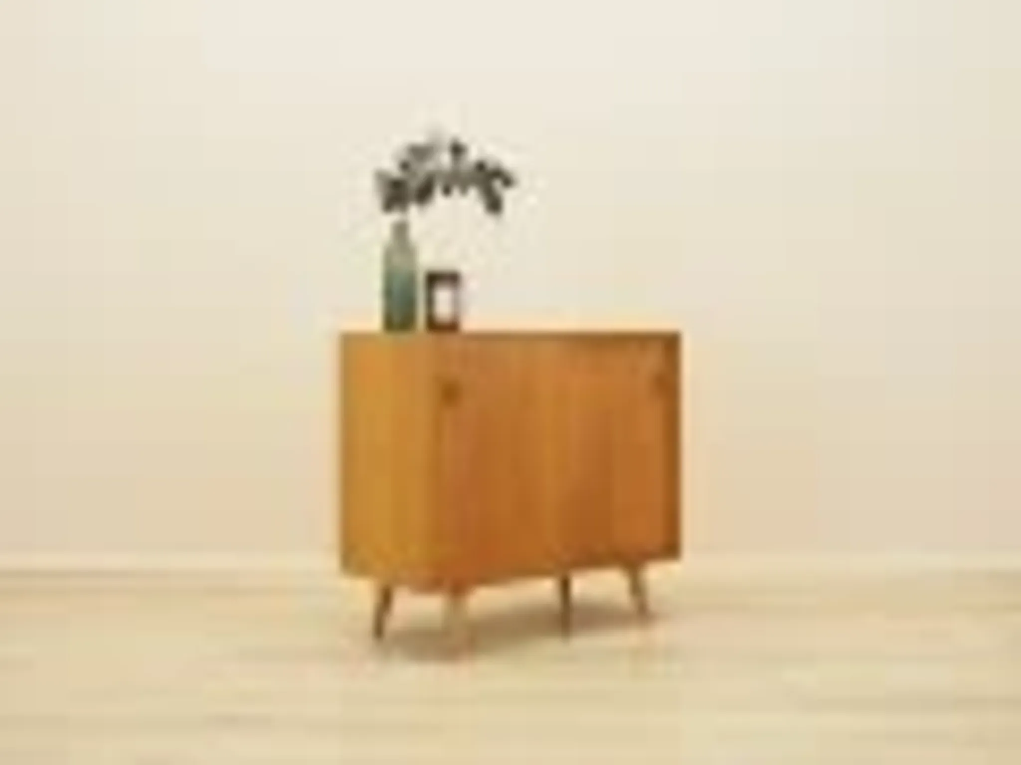 Ash cabinet with sliding doors by Hjørnebo, Danish, 1960s