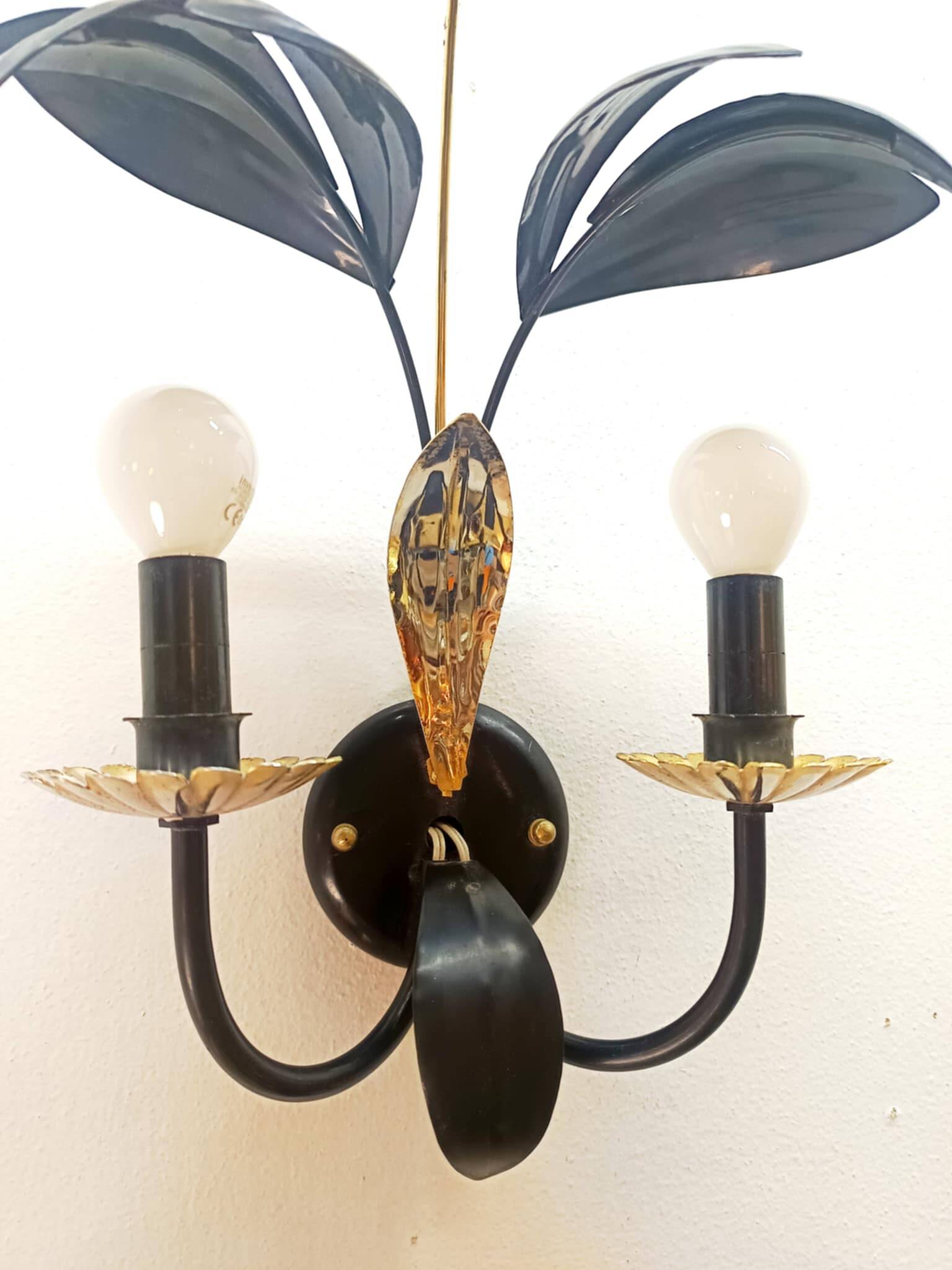 Black and gold Hollywood Regency leaf wall sconce