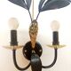 Black and gold Hollywood Regency leaf wall sconce
