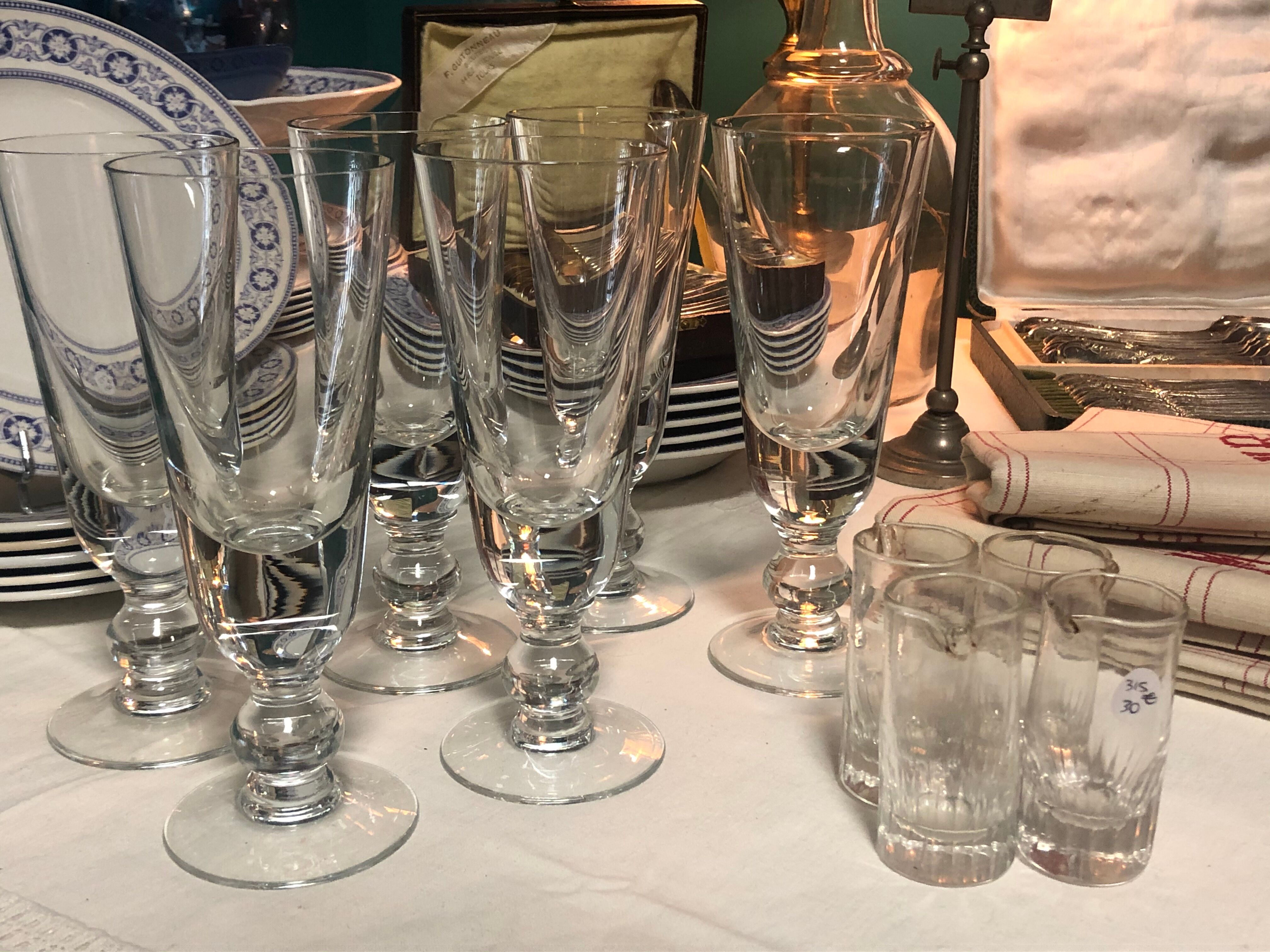 Four glasses with liqueur