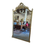 Very large Louis XVI style mirror in wood and gilded stucco with gold leaf