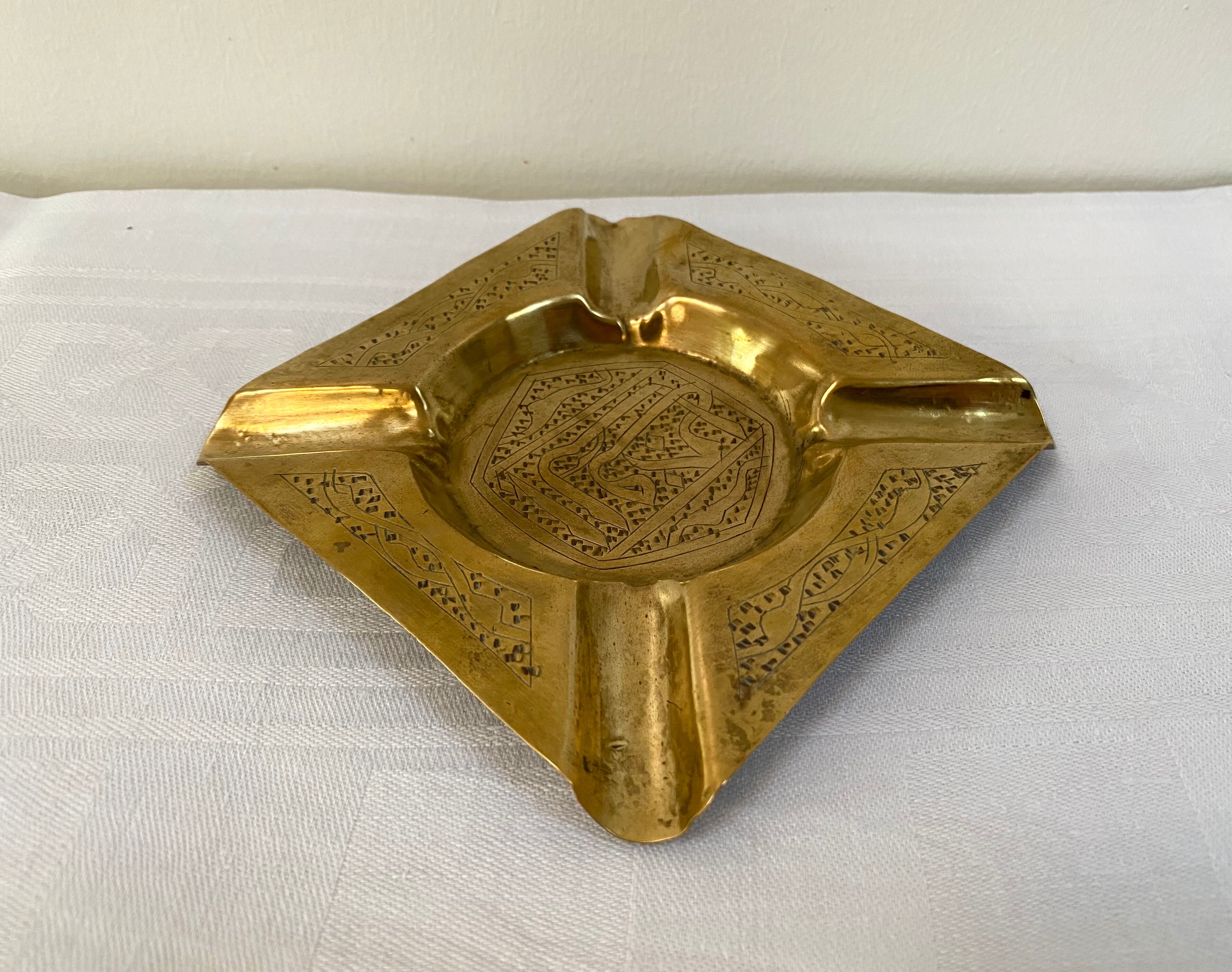 Old brass ashtray