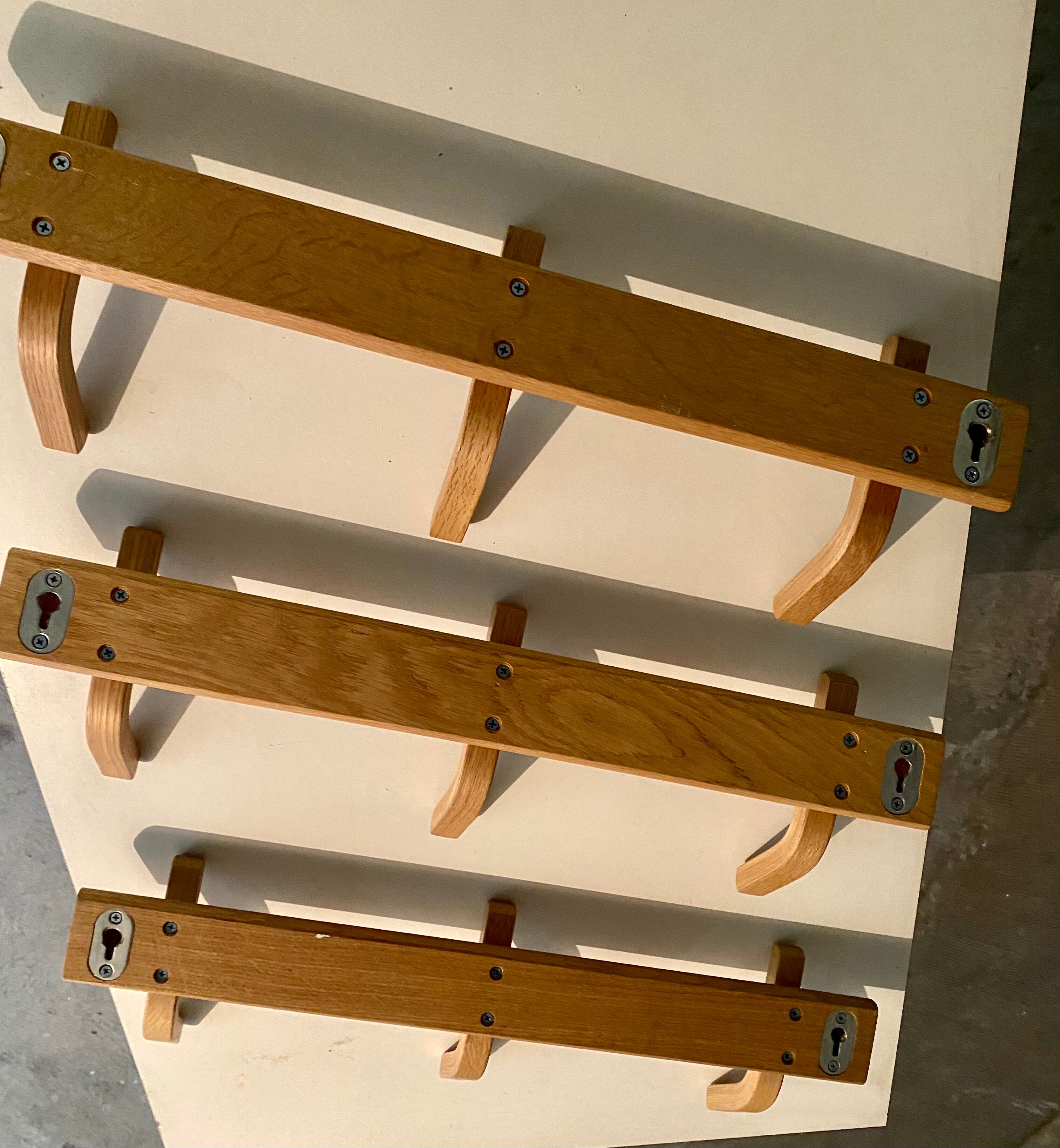 Wooden wall coat rack