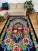 Rug with floral design on a blue background made by hand in Romania