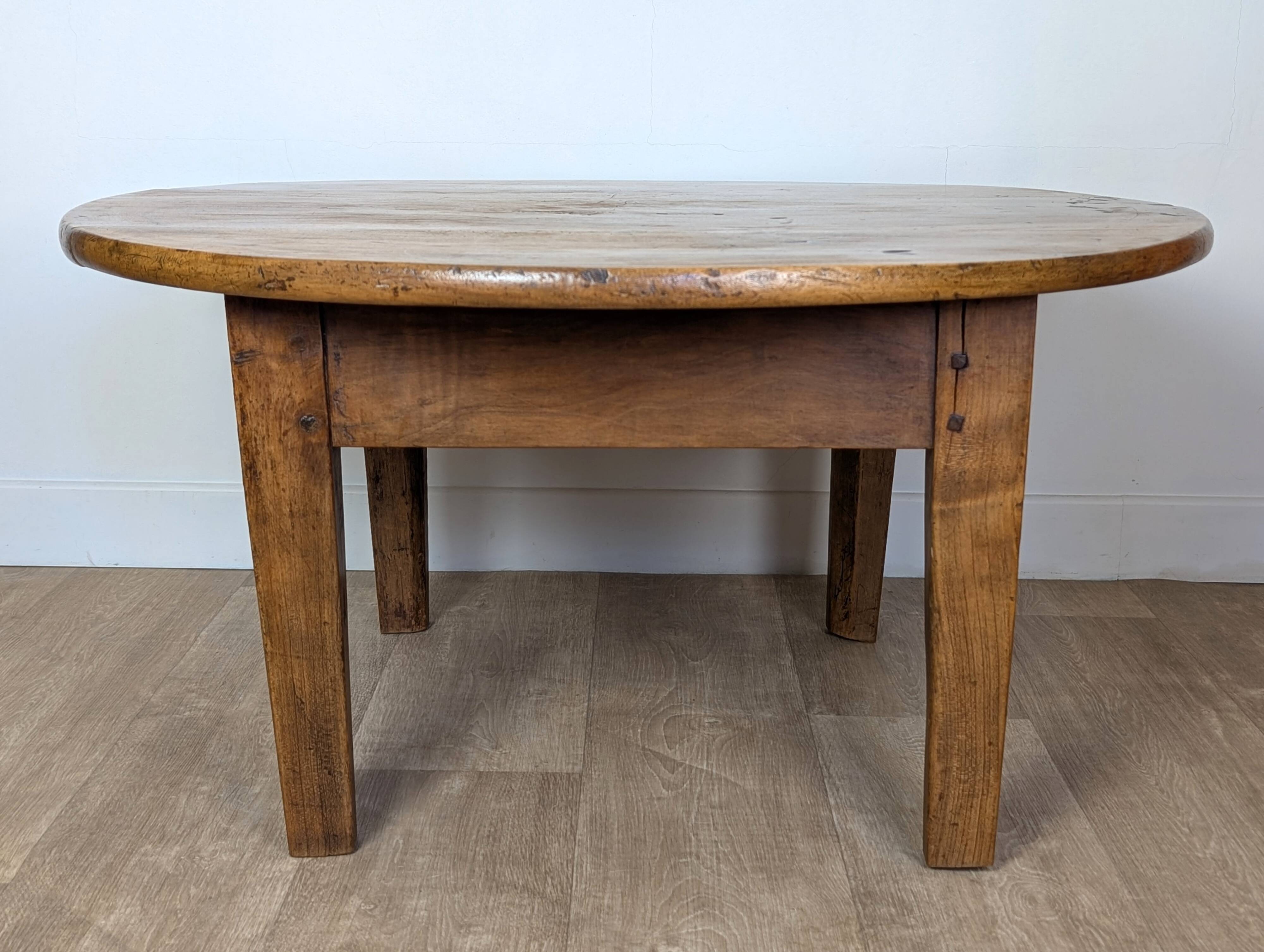Round walnut coffee table