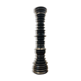 A brutalist black pepper mill
