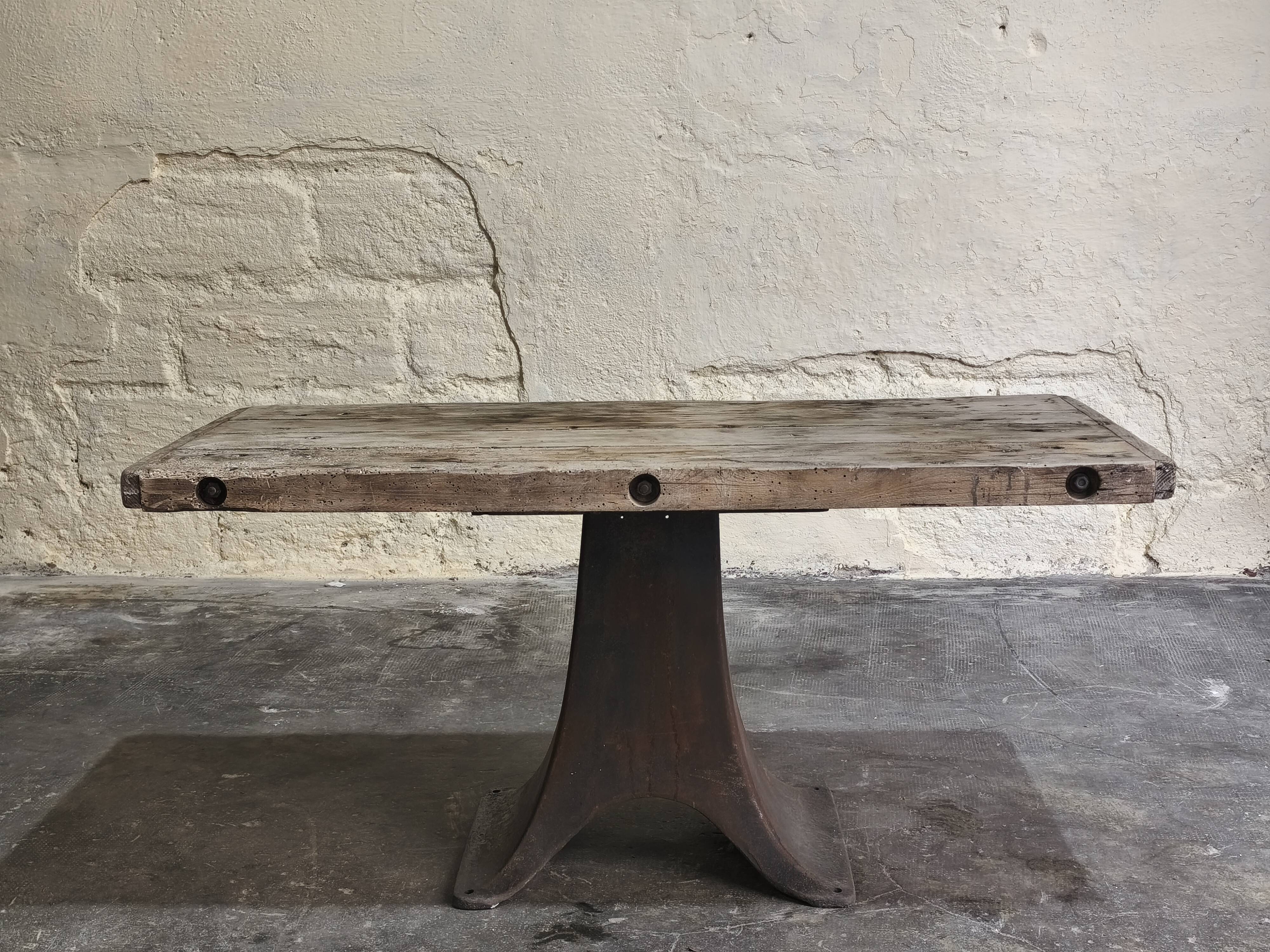 Solid oak coffee table with industrial cast iron legs