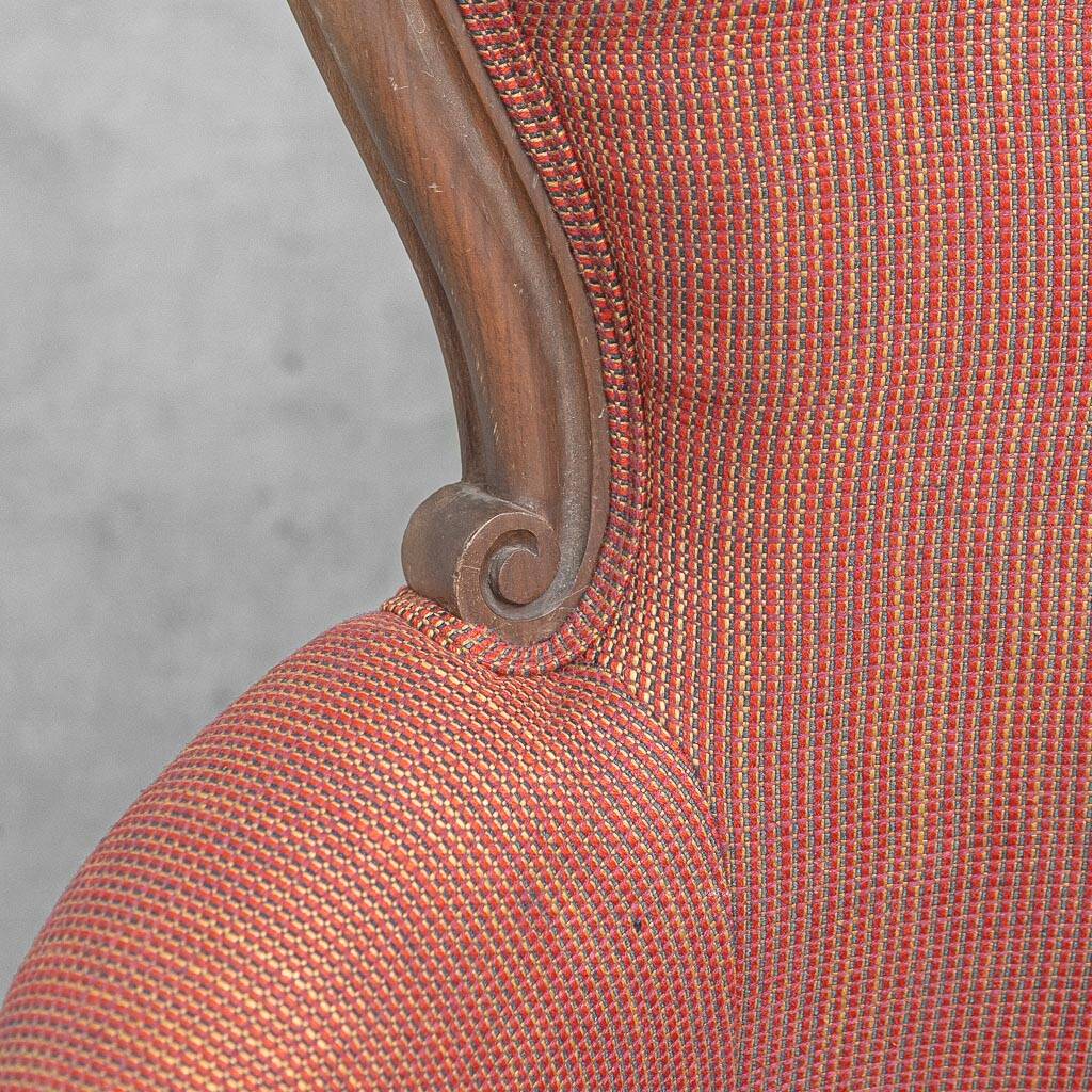 Pair of classic vintage armchairs in carved wood and fabric, 1950s