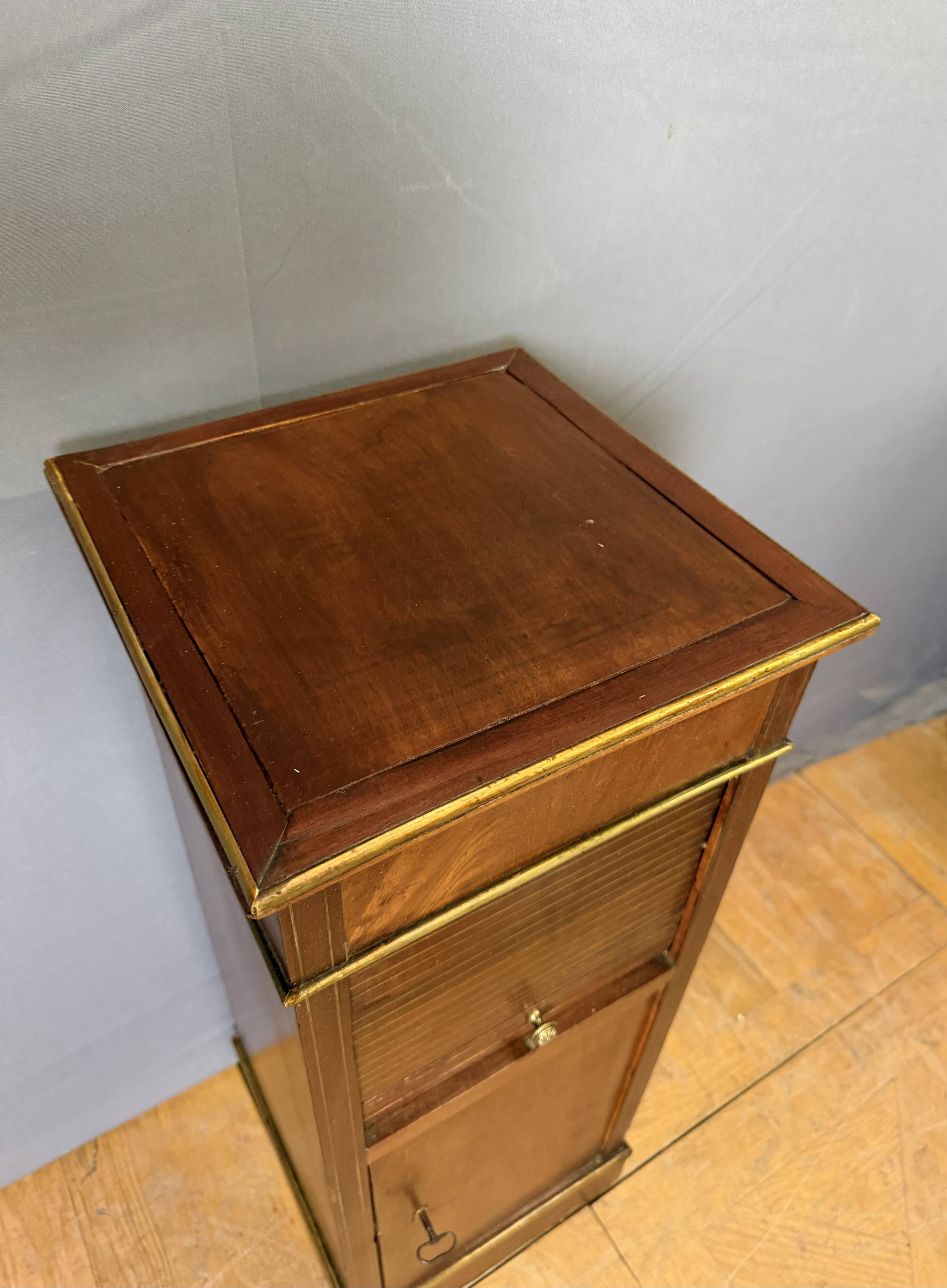 Directoire bedside table in mahogany and brass