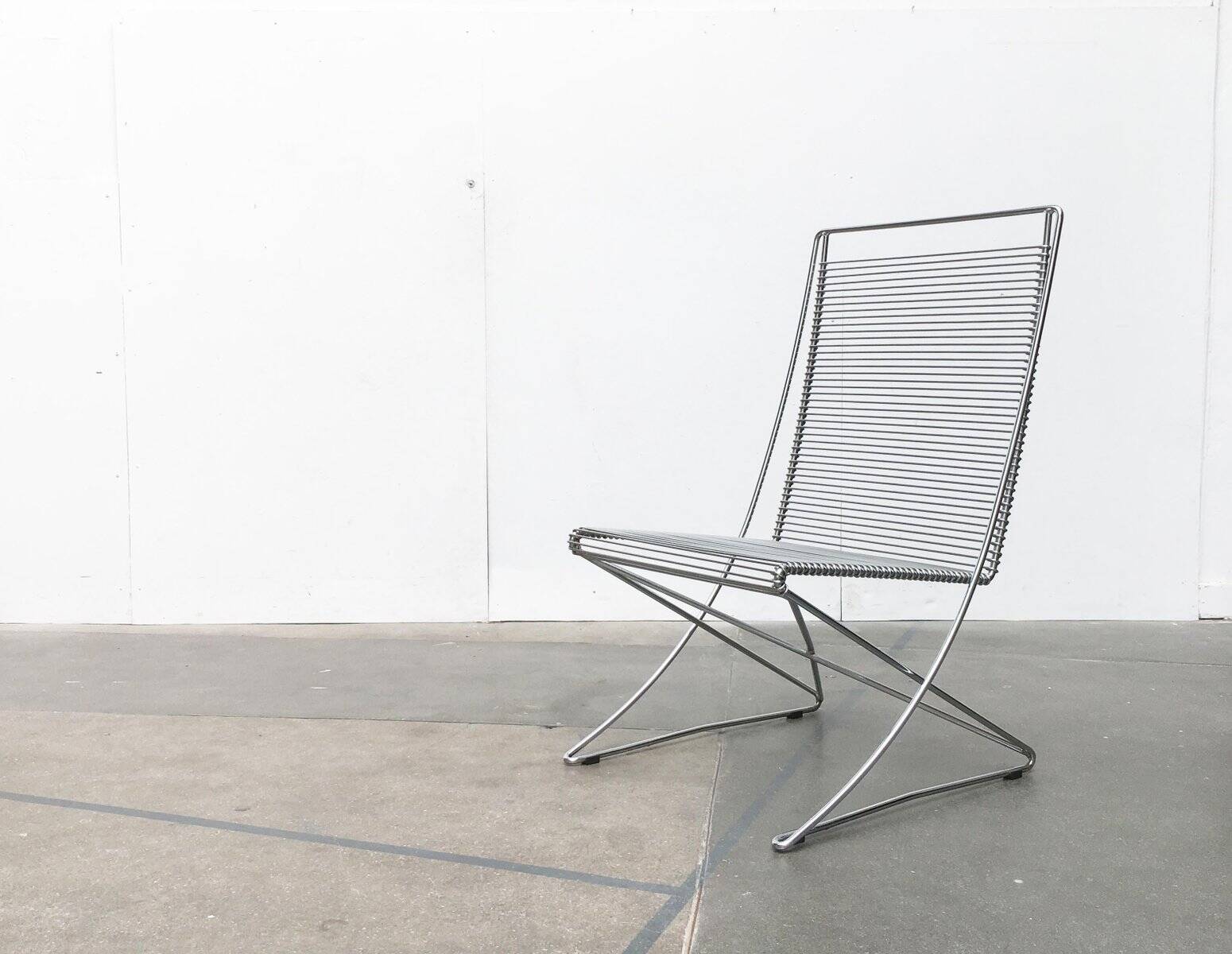 Vintage German Kreuzschwinger lounge chair by Till Behrens for Meyer Stahlmöbel, 1980s.