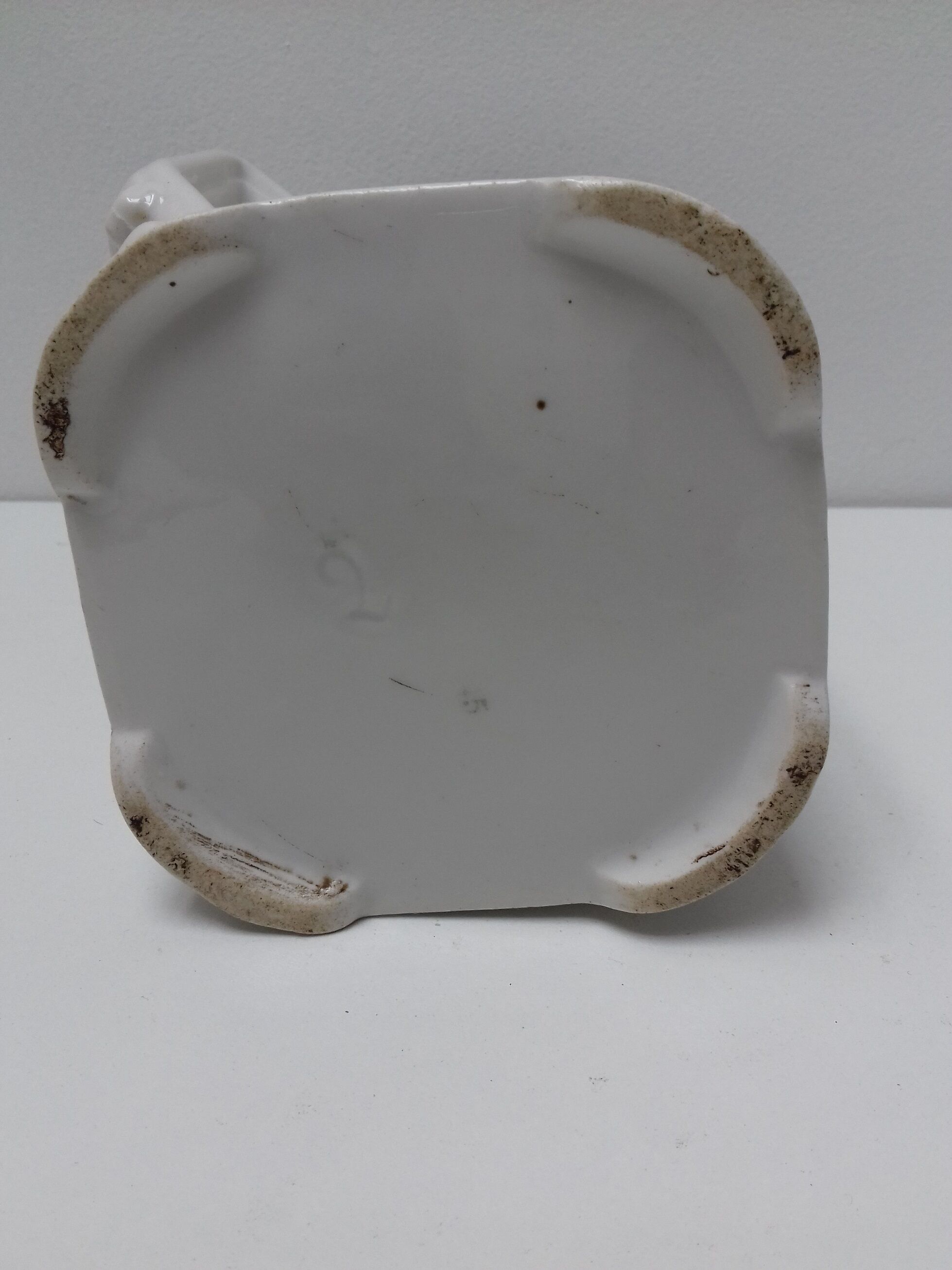 Ancient pitcher ceramic blue flowers