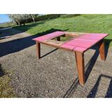 1960s oak dining table with integrated extensions.
