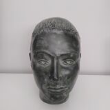 Sculpture face woman in plaster
