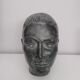 Sculpture face woman in plaster