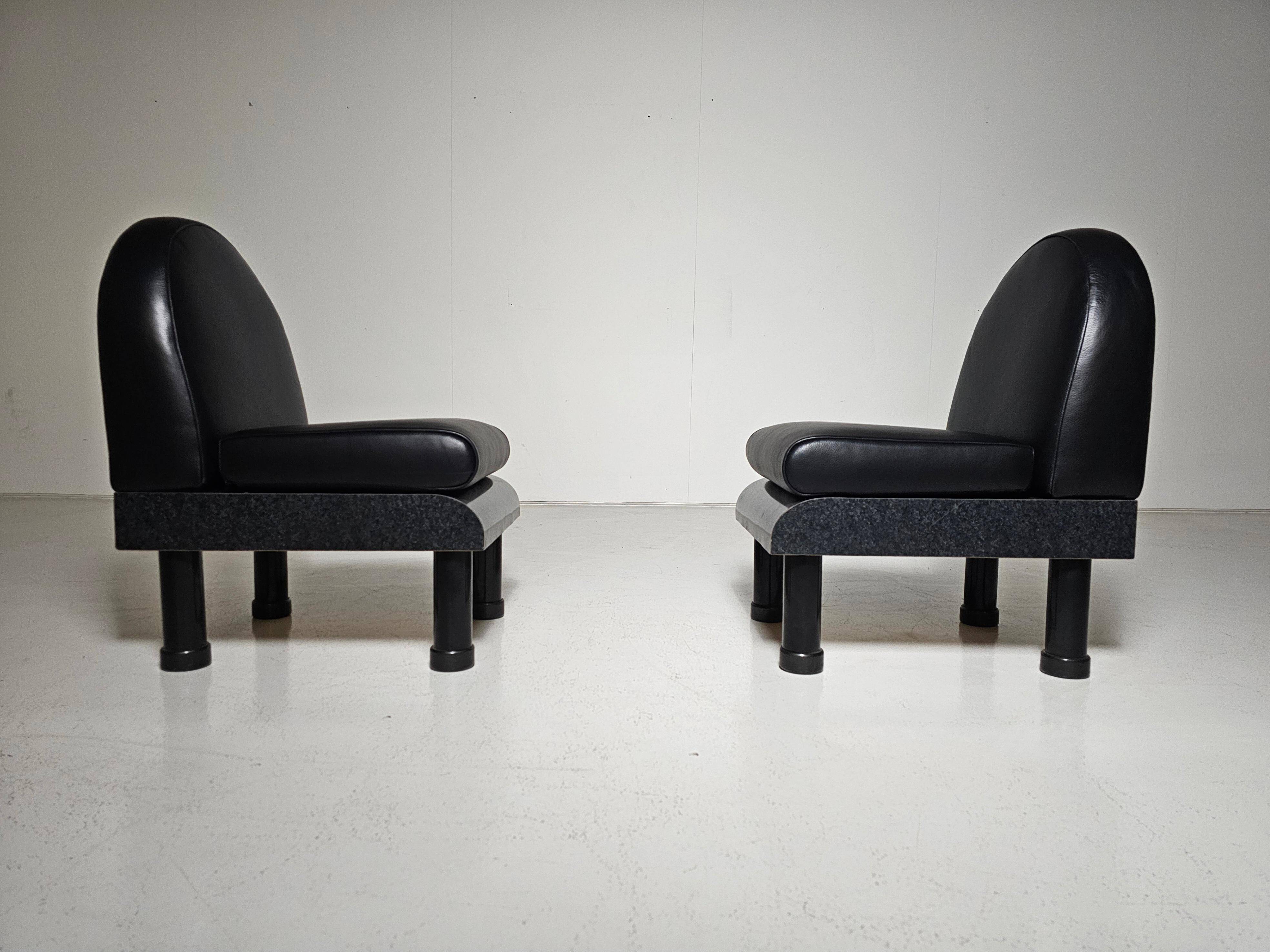 Black leather loungers , 1980.