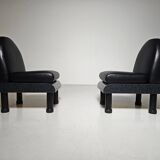 Black leather loungers , 1980.