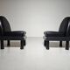 Black leather loungers , 1980.