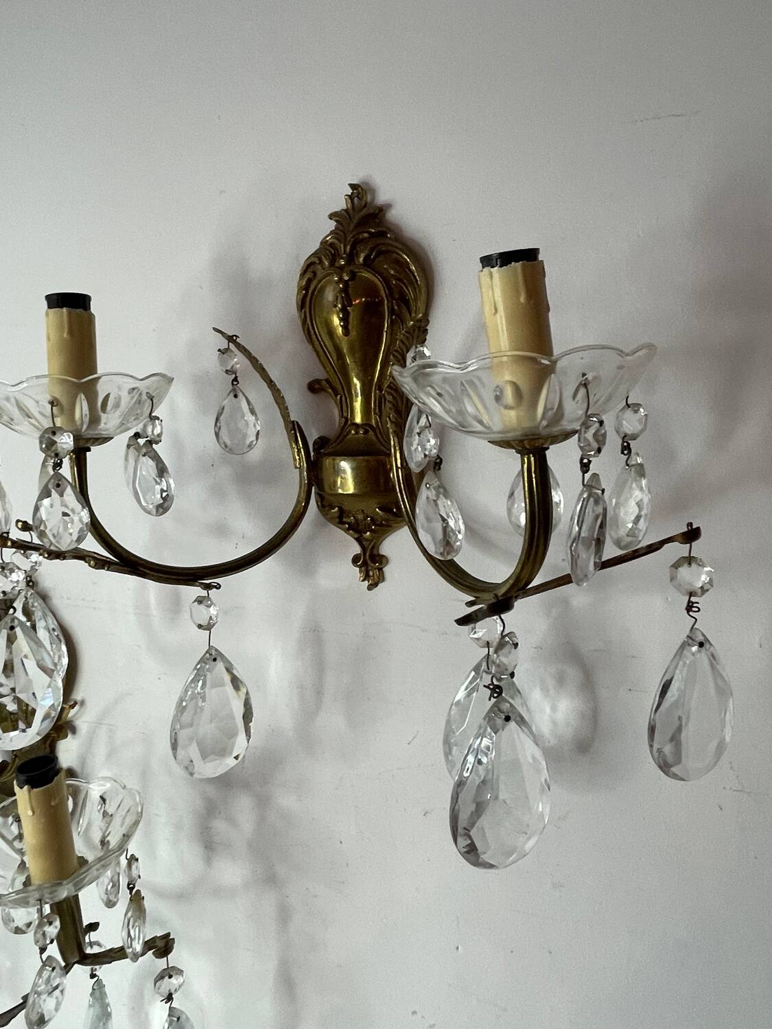 Pair of bronze and crystal wall lights