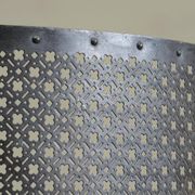 Half-moon antique wrought iron fire screen from the 19th century.