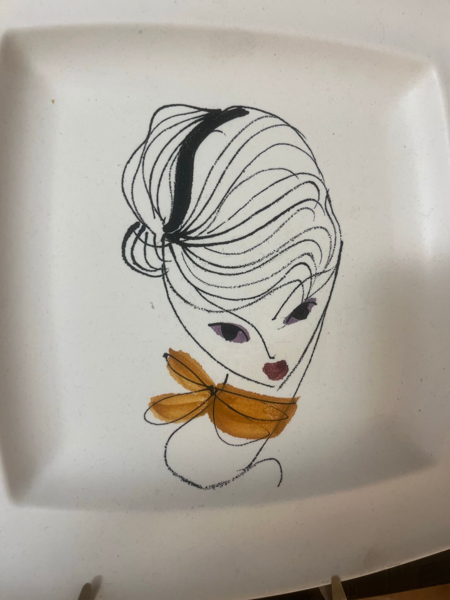 Women's décor plate from the 60s