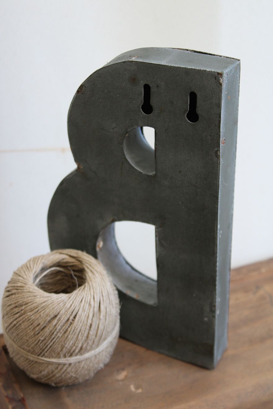 Letter of sign in zinc