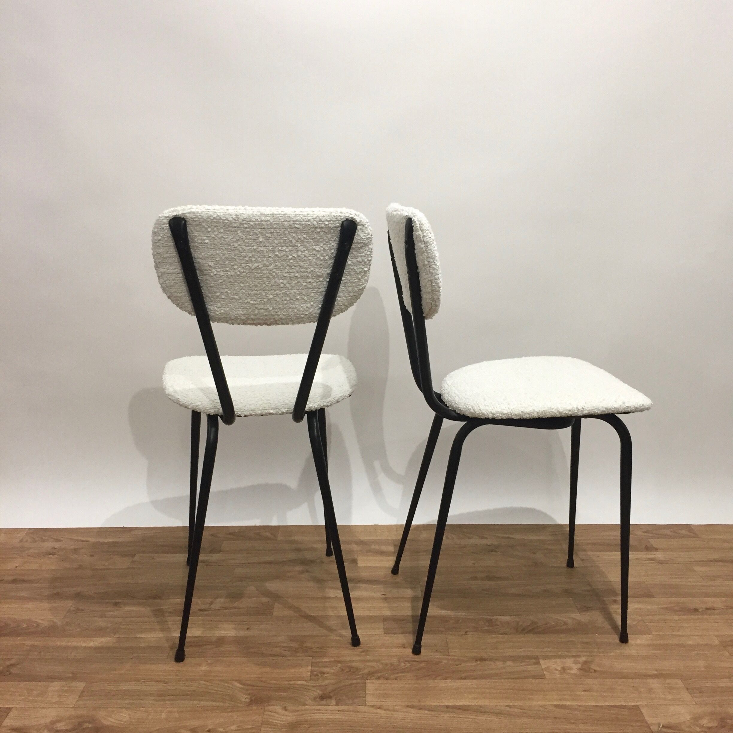 pair of reupholstered chairs loop