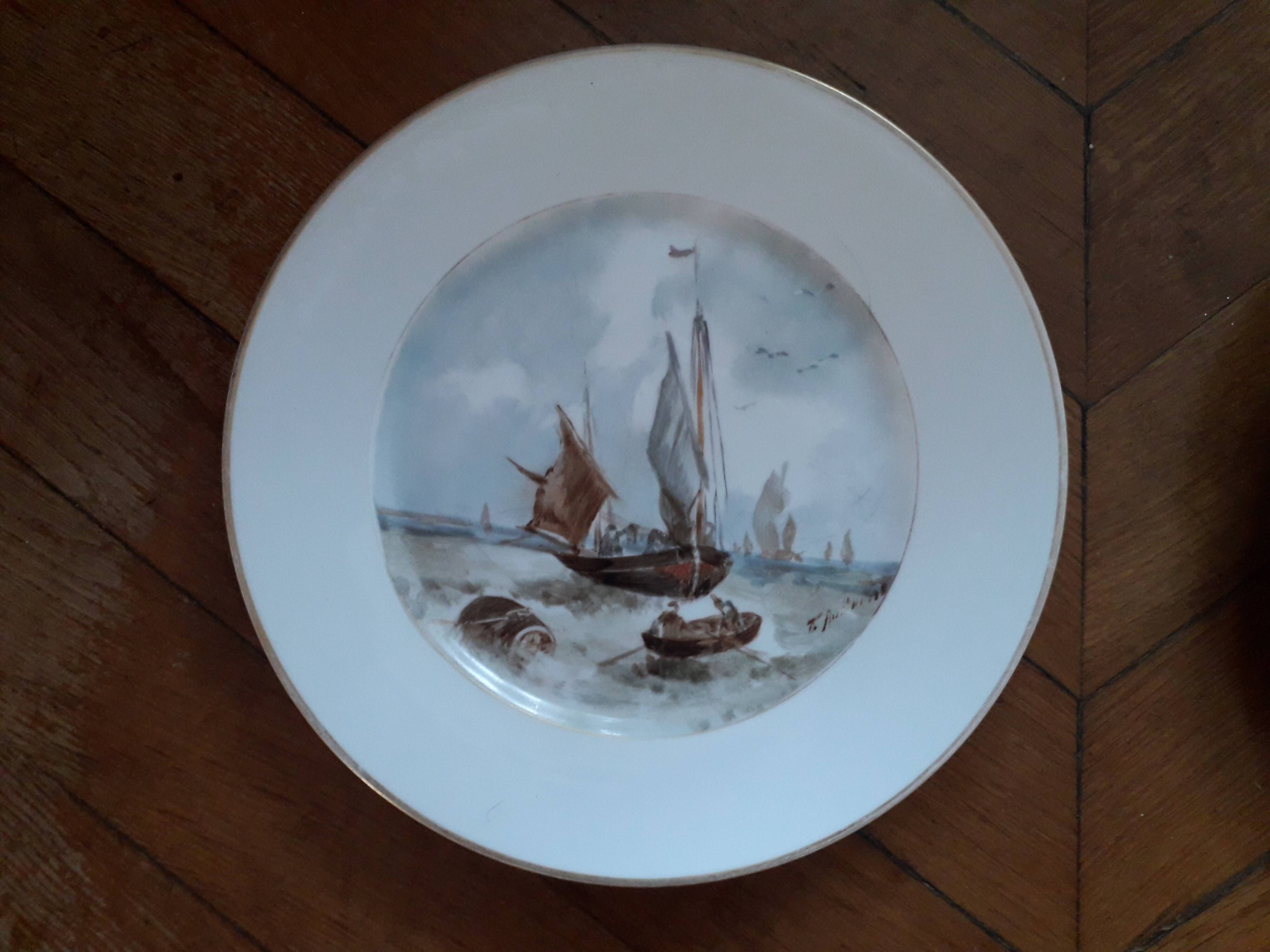 2 assiettes vintage signées avec un décor de mer