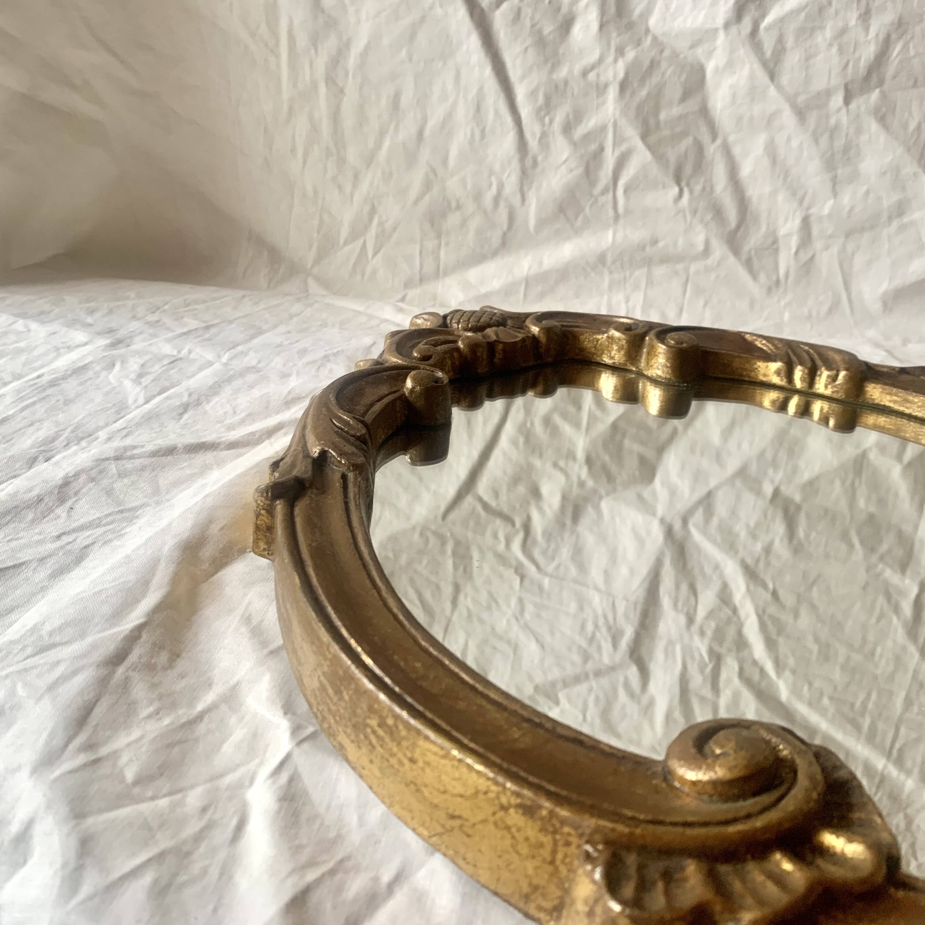 Vintage wall mirror in gold resin