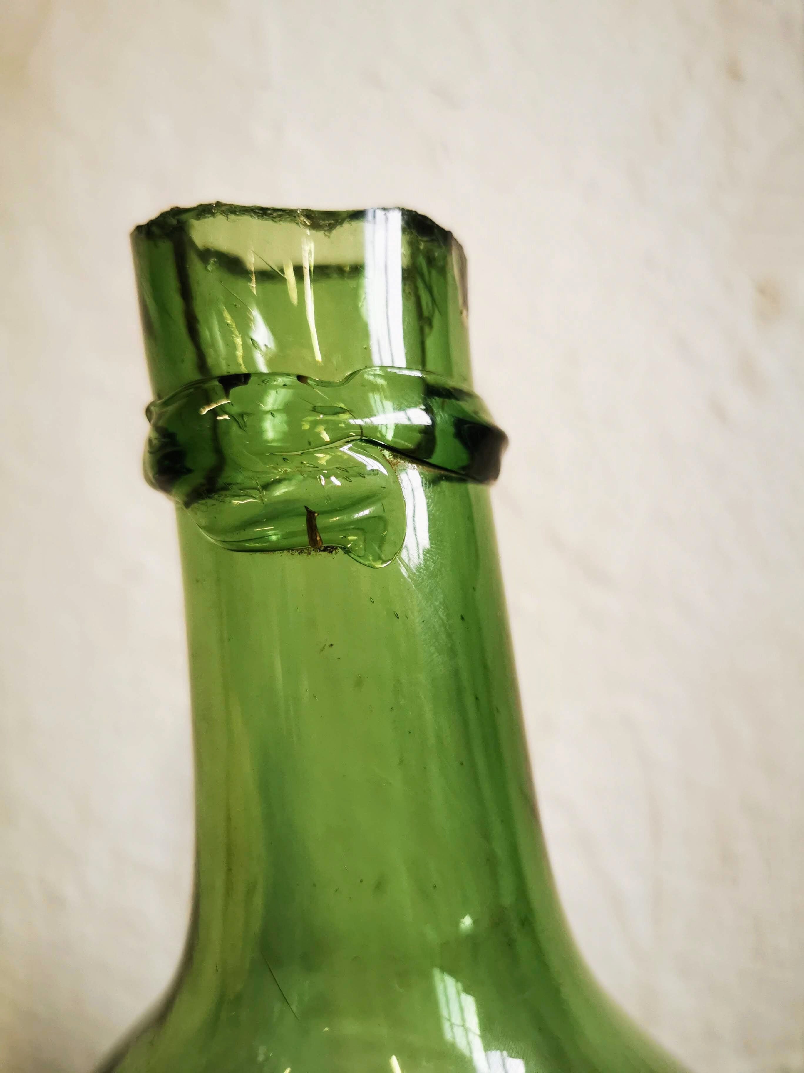 Green demijohn contains 12 liters