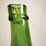 Green demijohn contains 12 liters