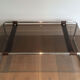 Table basse en chrome, cuir et verre fumé
