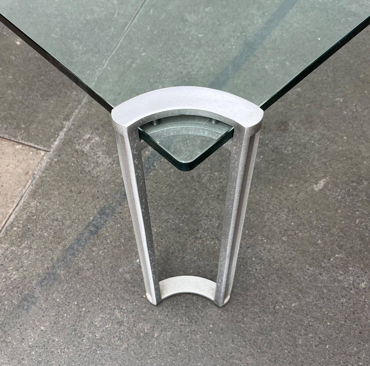 Vintage Space Age coffee table in glass and aluminium attributed to Peter Ghyczy, 1970s.