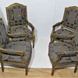 4 armchairs and a gilded wooden sofa Louis XVI style