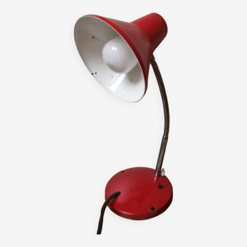 Articulated vintage red metal factory desk lamp