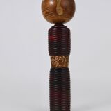 Decorative Kokeshi doll sculpture from northern Japan, hand-painted, signed.