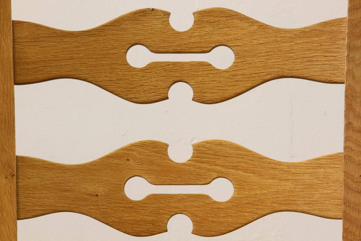 Vintage 1960s brutalist Danish modern oak dining chairs in the style of Henning Kjærnulf