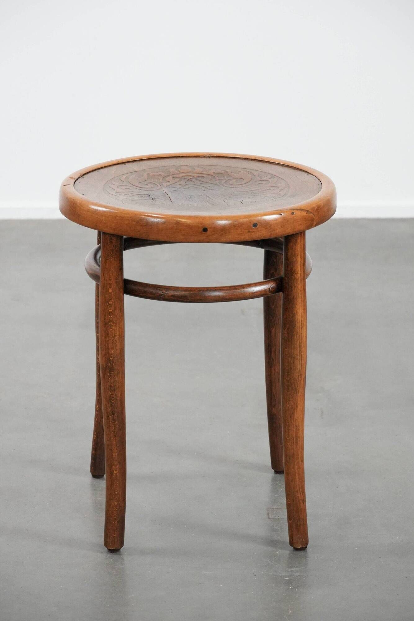 Antique bentwood stool from early 1900s with a seat with beautiful details