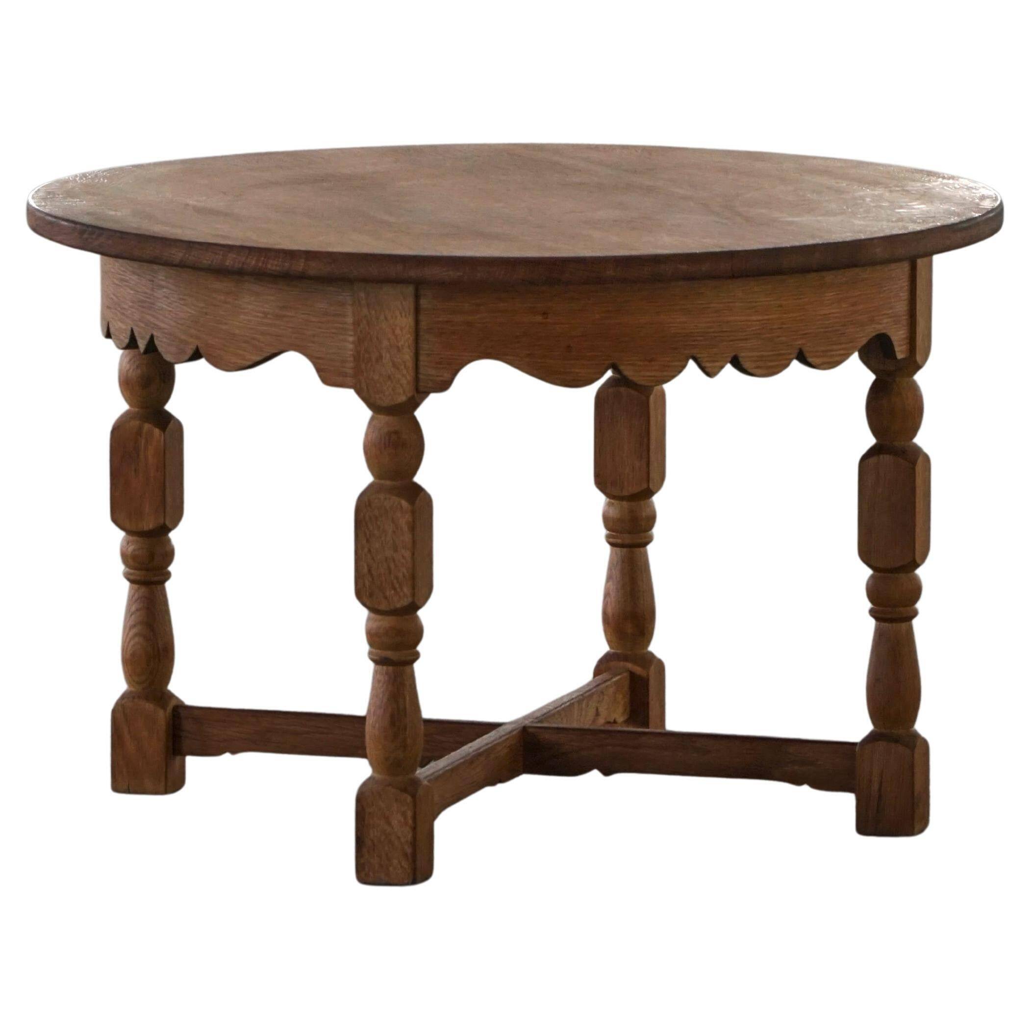 Mid-century Danish round side table in solid oak, Henning Kjærnulf, 1960s.