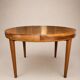 Vintage extendable round table, French made from the 1960s/70s.