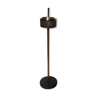Gold metal standing ashtray and black marble base
