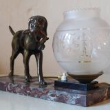 French Art Deco hunting dog on a marble base with a switched lamp.