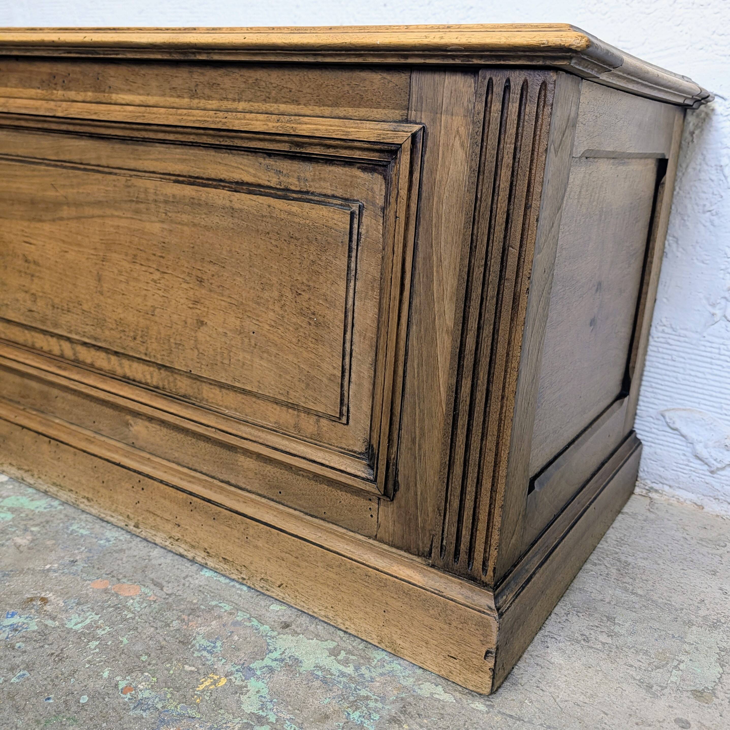 Antique wooden chest with moulded panels
