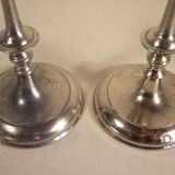 Pair of candlesticks in silver metal