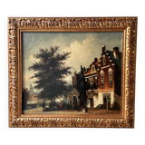 Dutch street scene oil painting in ornate frame signed Nijland