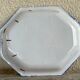 Antique octagonal plate in blue and white pottery with bird decoration.
