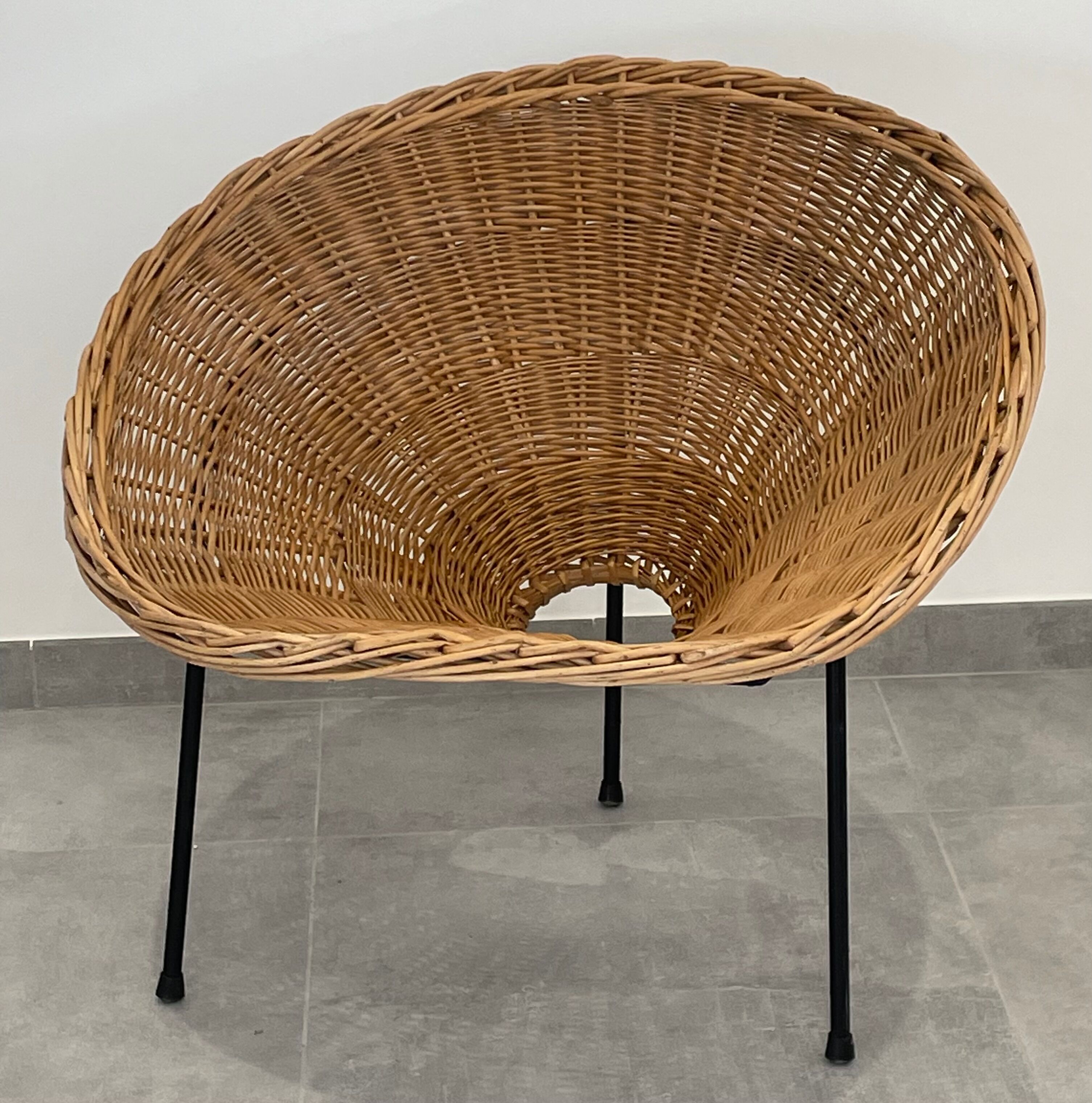 Pair of rattan and black metal armchairs, 1950s/60s