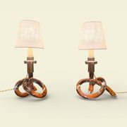 Pair of "Bretzel" lamps in lucite and brass, by Dorothy Thorpe (1901)